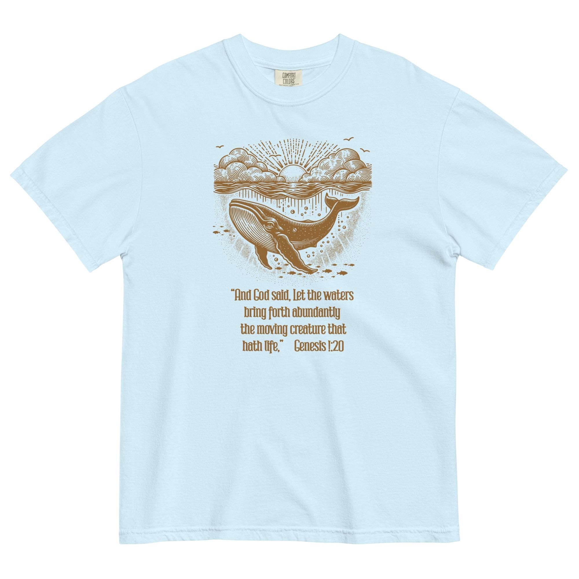 Light blue t-shirt with a whale graphic and text on a white background