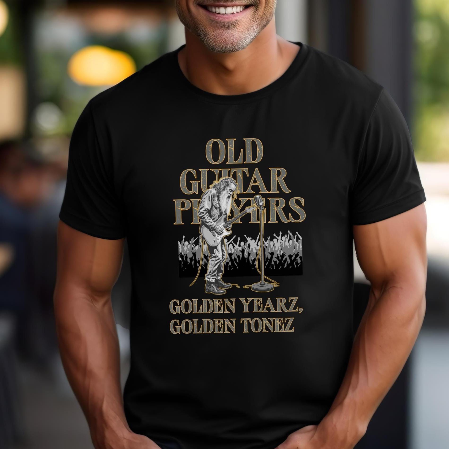 Man wearing a black t-shirt with a graphic design and text.