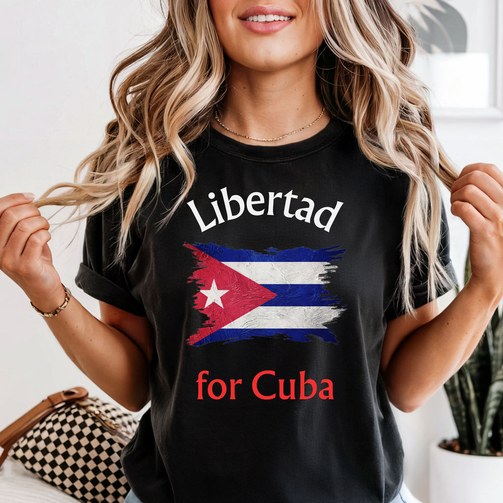 Person wearing a black t-shirt with 'Libertad for Cuba' text and flag design.